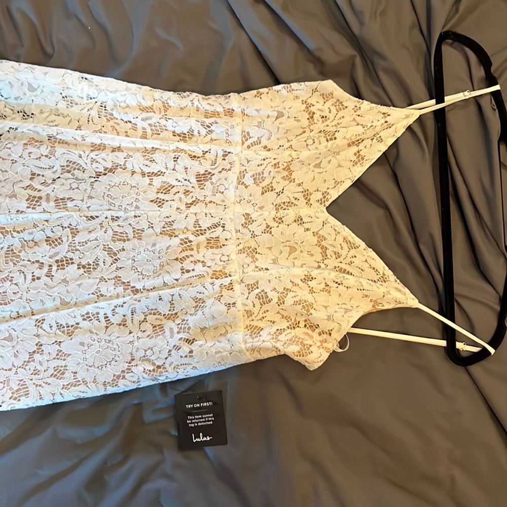LuLu’s brand midi dress, white lace with beige lining.